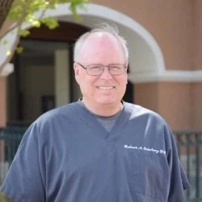 A headshot photo of dentist Robert A. Cederberg