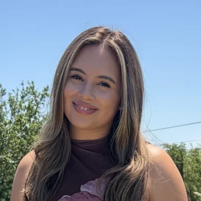 A headshot photo of Monica